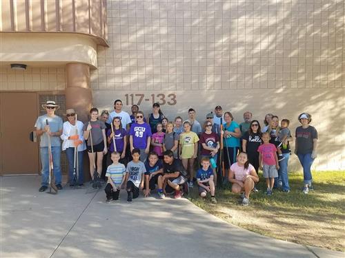 KC club in front of acacia
